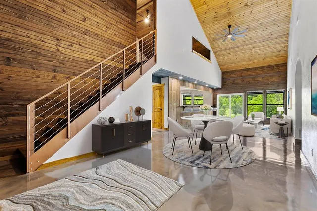 a view of a patio with couches table and chairs