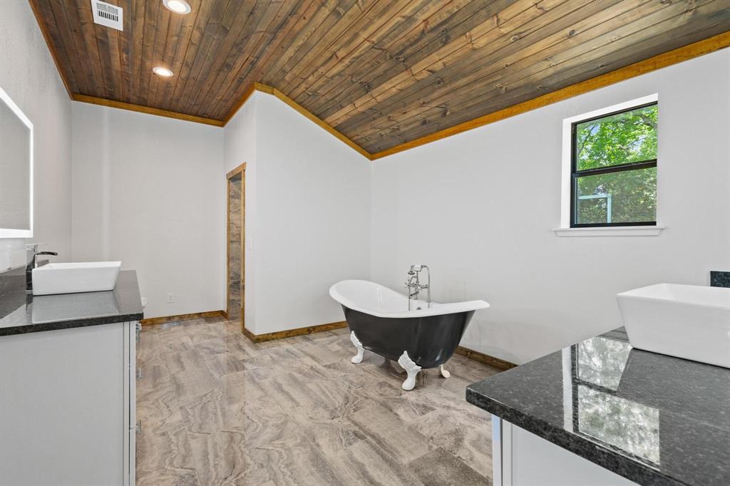 516 County Road Honey Grove, TX 75446 - Photo 8 of 27 a living room with furniture and a window