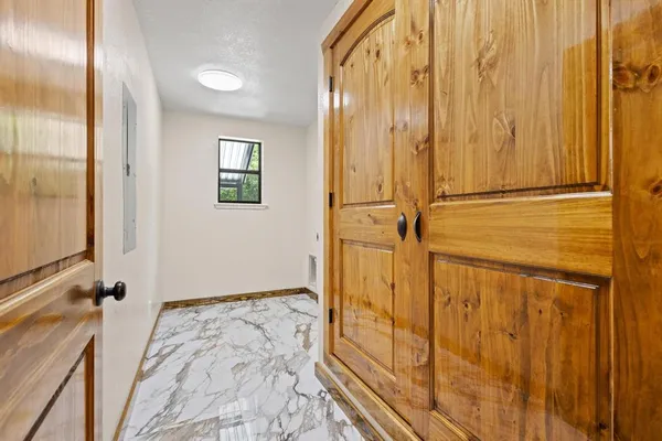a view of a bathroom with mirror