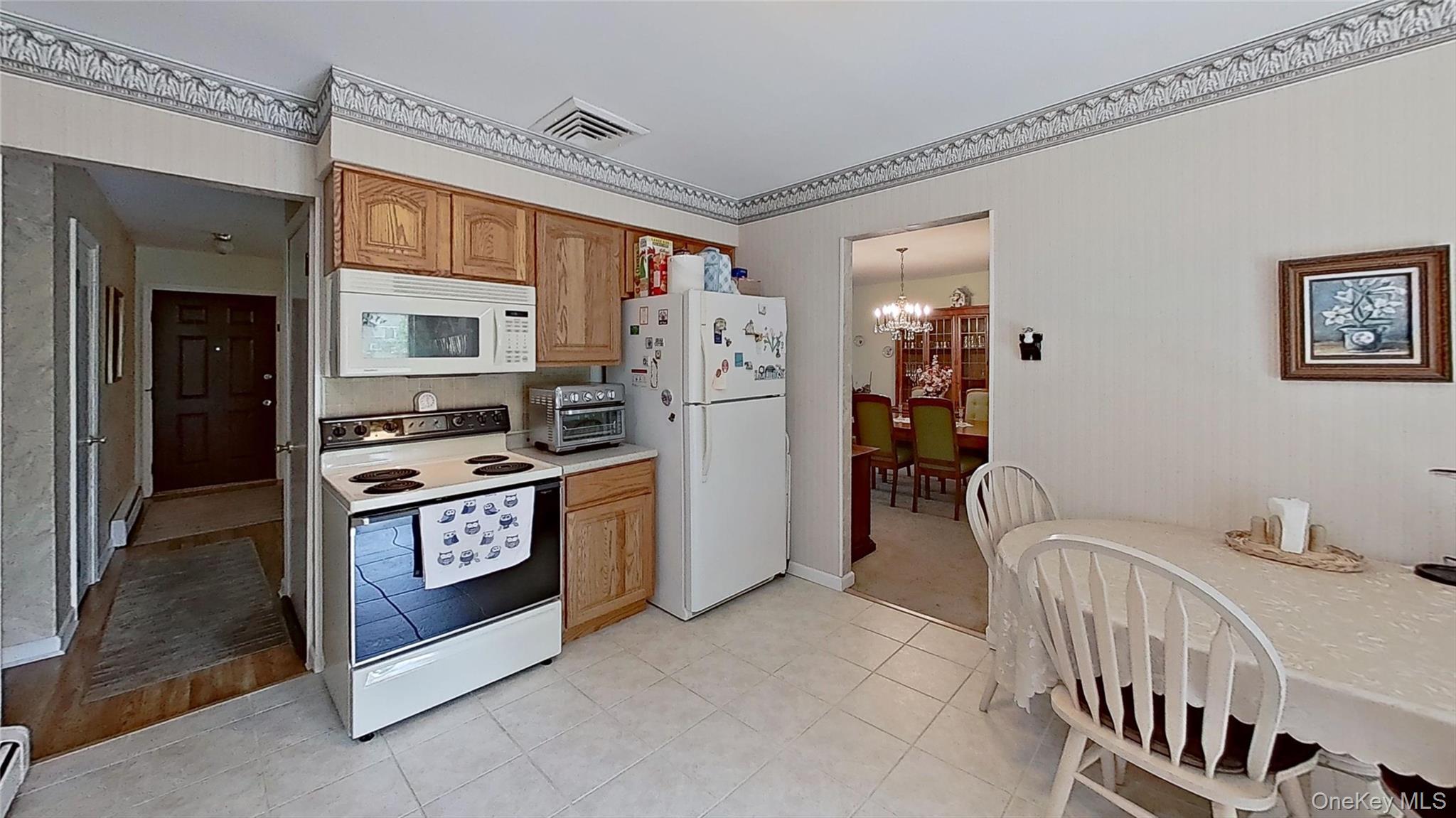 347 Miller Place Road Miller Place, NY 11764 - Photo 8 of 29 Kitchen views show multiple ways to benefit when inside or out!