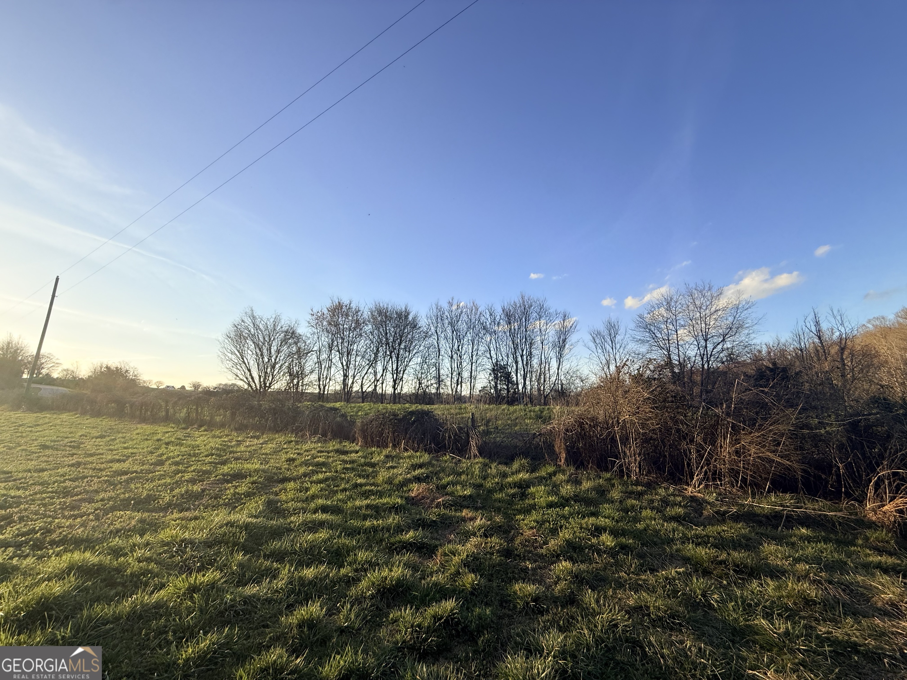 18 West L Williams Commerce, GA 30530 - Photo 29 of 30 a view of a lake with houses in the back