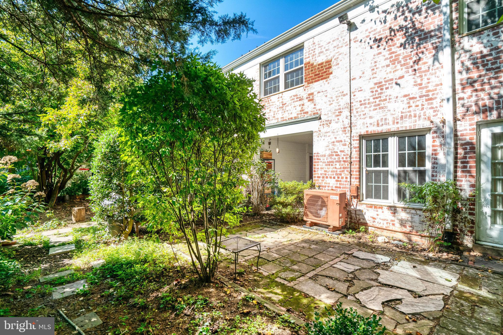 3239 Gunston Road Alexandria, VA 22302 - Photo 19 of 58 a view of a house with backyard