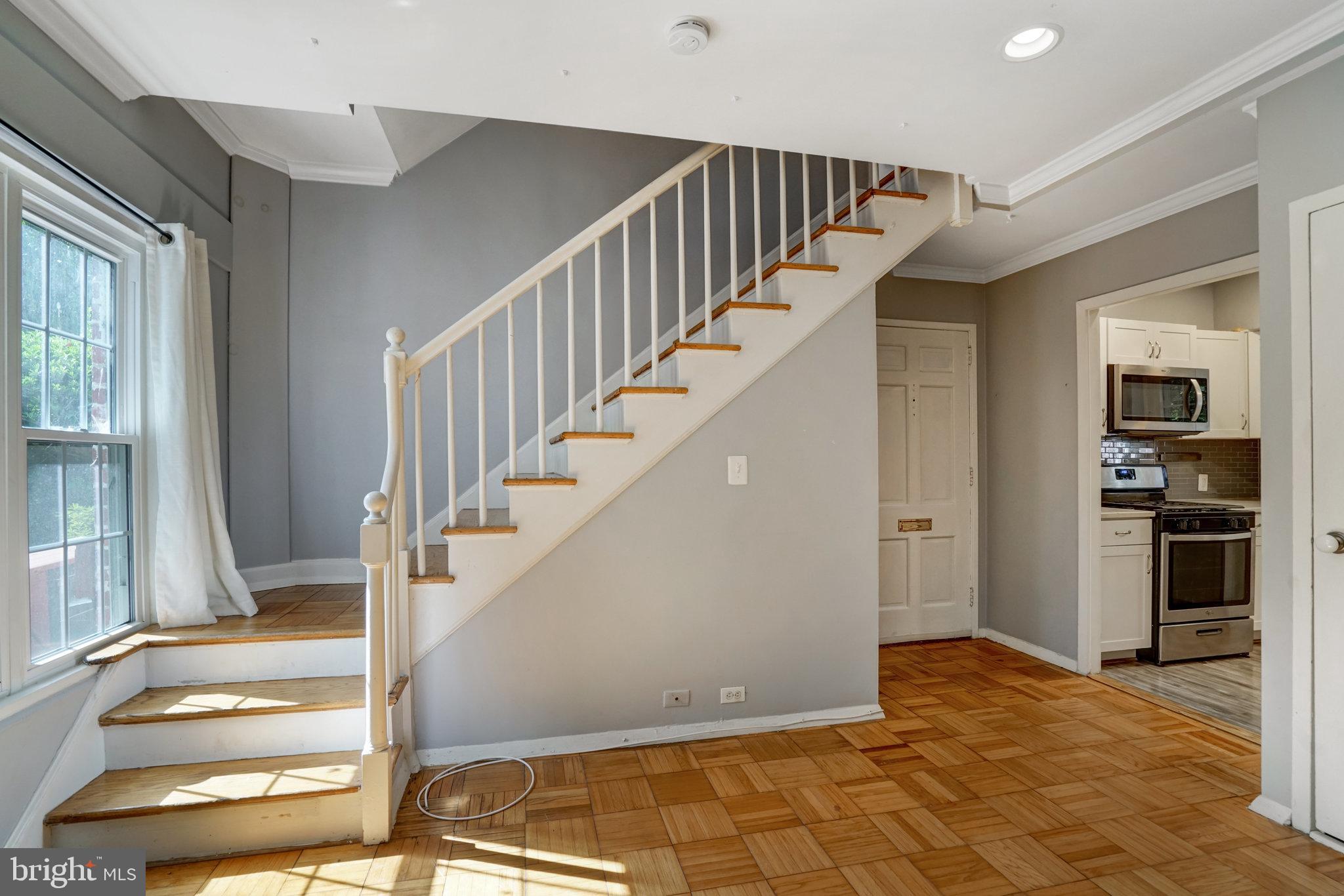 3239 Gunston Road Alexandria, VA 22302 - Photo 24 of 58 a view of entryway and hall with a living room