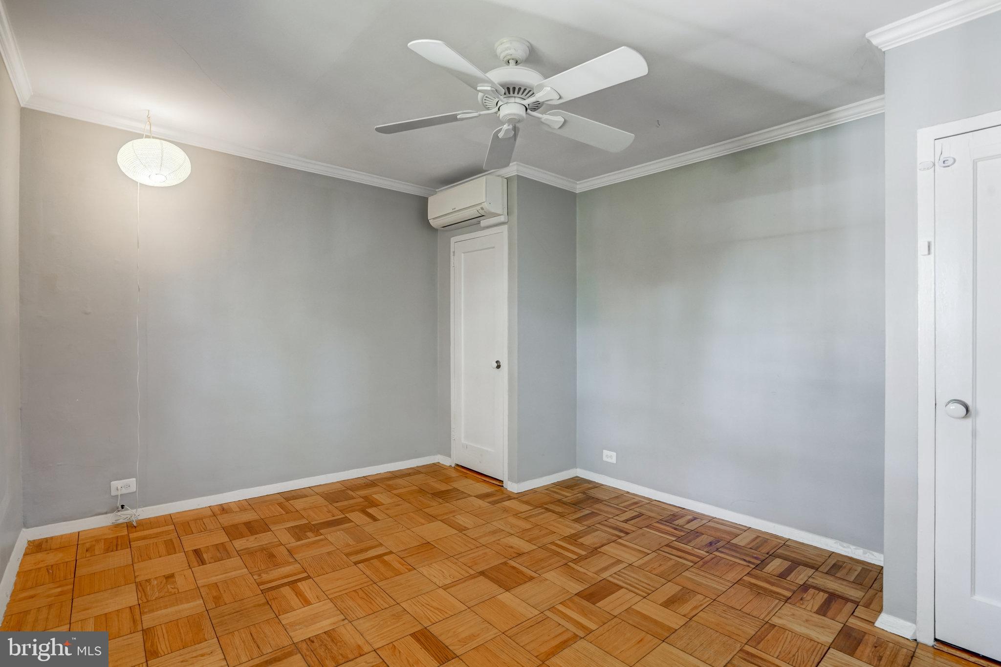 3239 Gunston Road Alexandria, VA 22302 - Photo 33 of 58 a view of a room with a ceiling fan and carpet
