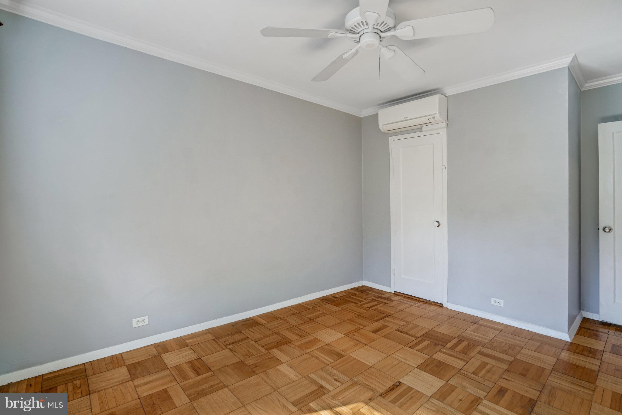 3239 Gunston Road Alexandria, VA 22302 - Photo 39 of 58 a view of a room with a chandelier fan and closet