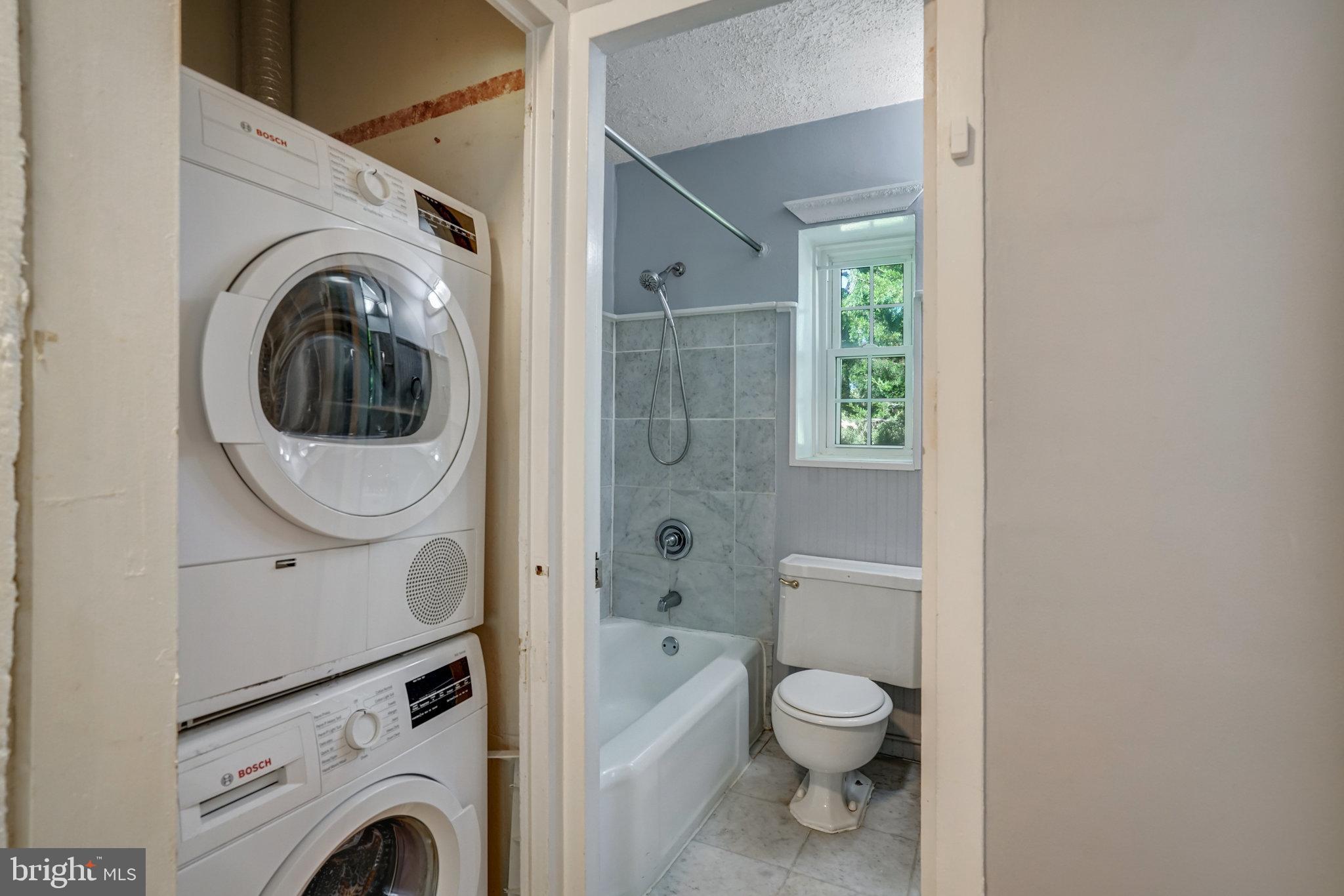 3239 Gunston Road Alexandria, VA 22302 - Photo 41 of 58 a view of bathroom with a washer and dryer