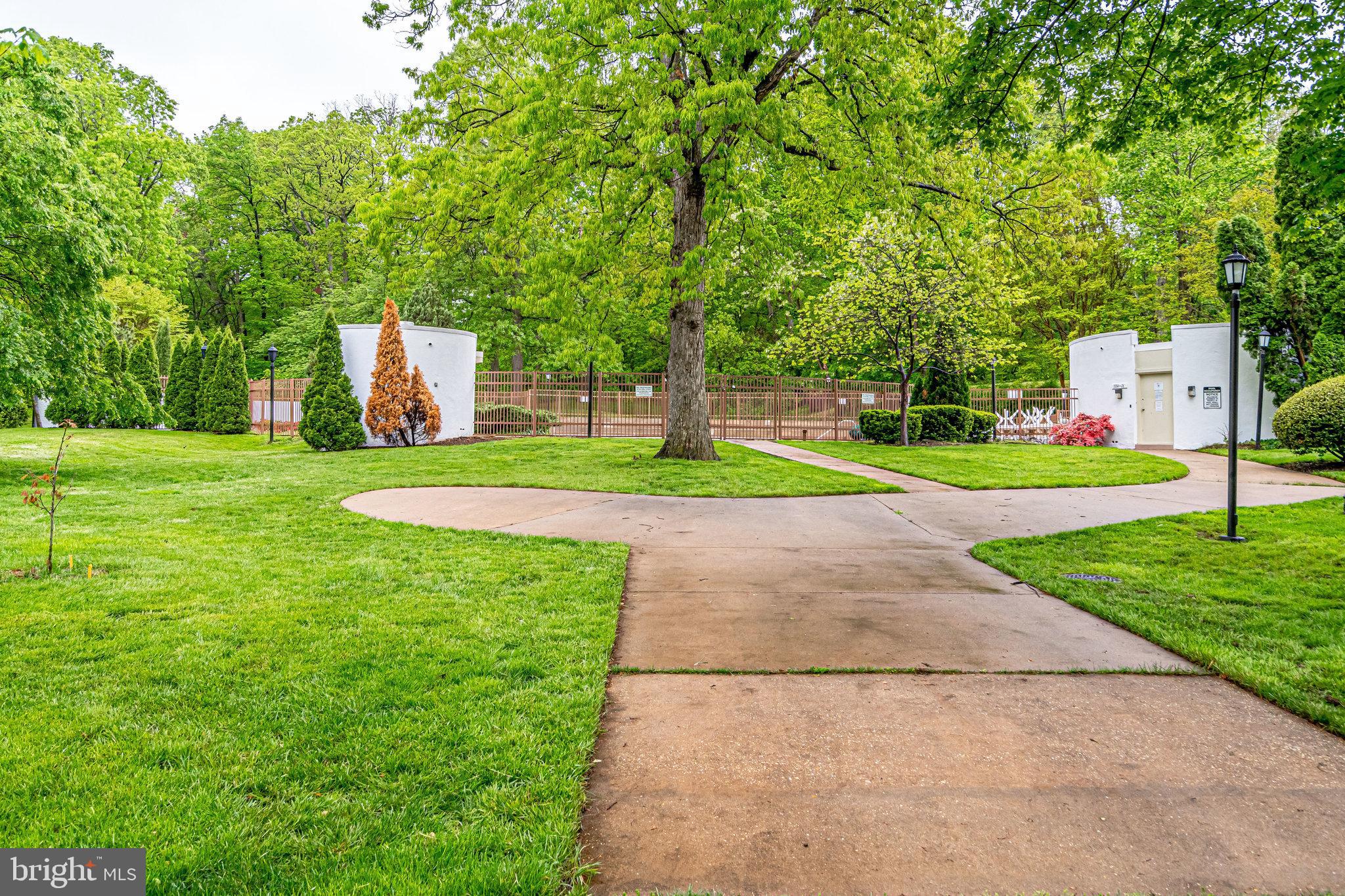 3239 Gunston Road Alexandria, VA 22302 - Photo 52 of 58 a green field with trees in the background