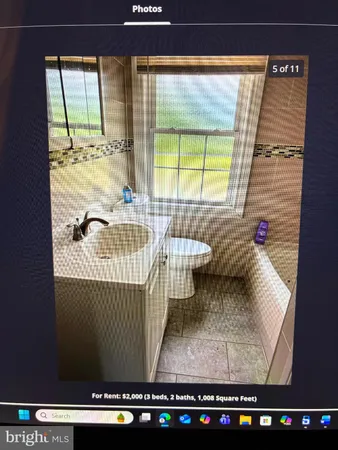 a living room with a couch and a table