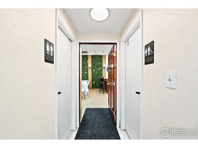 a room with musical instruments and wooden floor