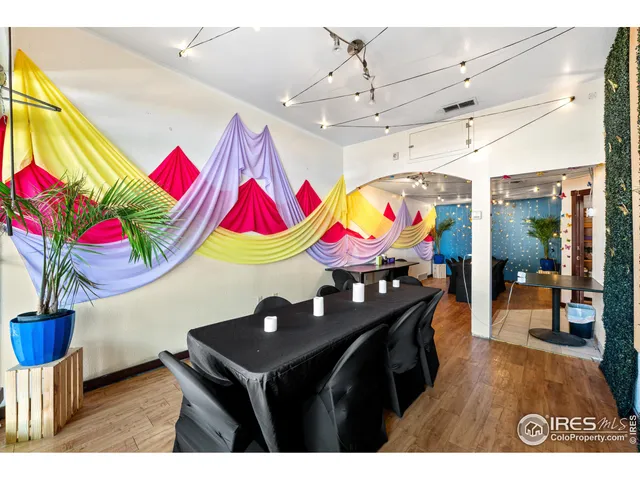 a view of a living room and dining room