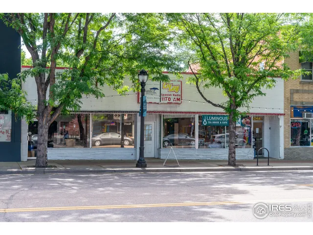 a view of a chairs and table in a patio