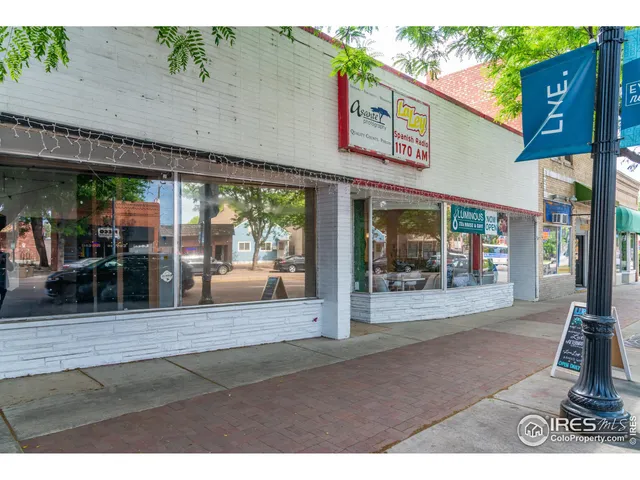a view of a chairs and table in a patio