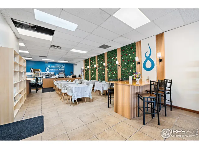 a bathroom with a sink toilet and mirror