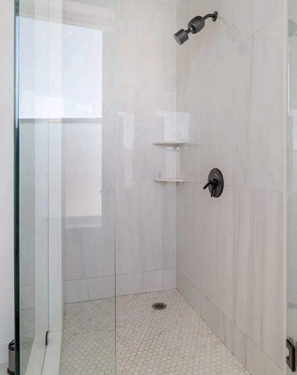243 Condor Street, Unit 4 Boston, MA 02128 - Photo 11 of 13 a bathroom with a shower