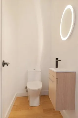 a bathroom with a toilet and a sink