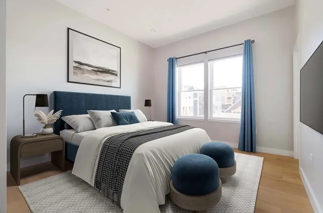 a bed room with bed and a window