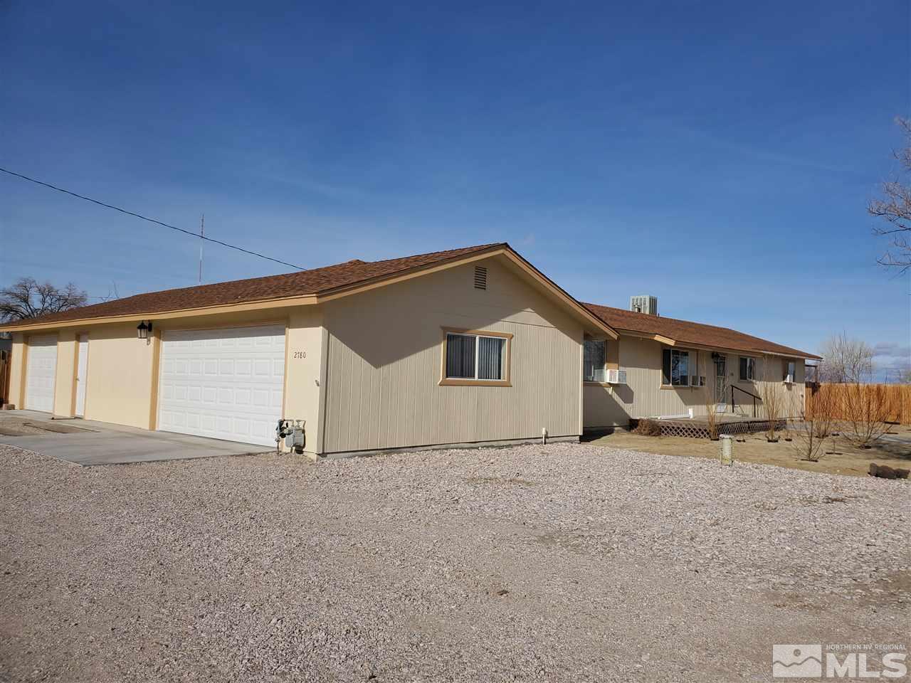 2780 Rice Road Fallon, NV 89406 - Photo 21 of 21 a view of garage and wooden fence