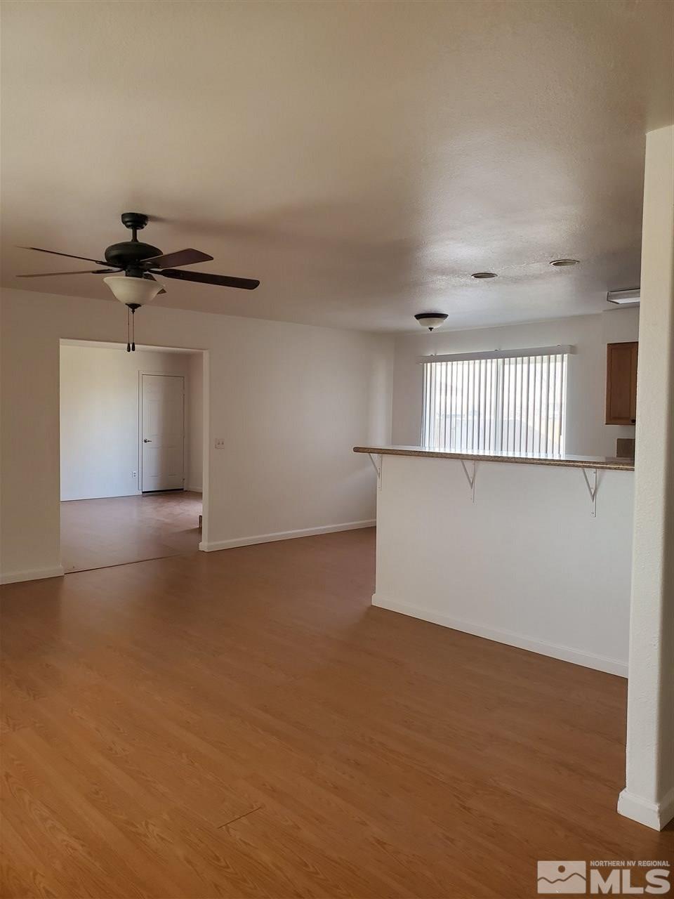 2780 Rice Road Fallon, NV 89406 - Photo 7 of 21 a view of a livingroom with a staircase