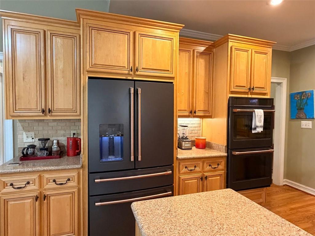 1015 Forest Overlook Trail Southwest Atlanta, GA 30331 - Photo 2 of 16 a kitchen with stainless steel appliances granite countertop a refrigerator and microwave