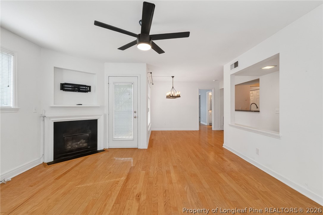 1221 Westview Lane, Unit 301 Raleigh, NC 27605 - Photo 12 of 32 a view of empty room with a fireplace