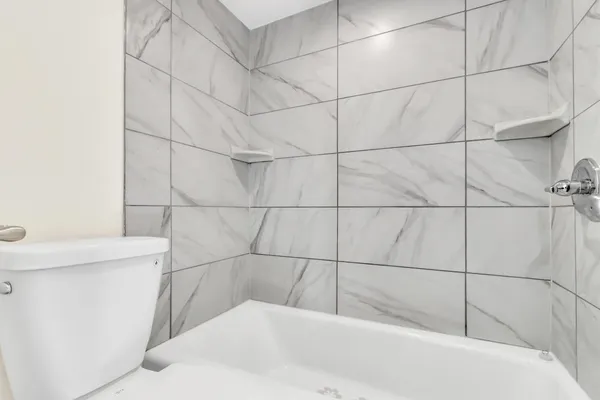 a bathroom with a bathtub