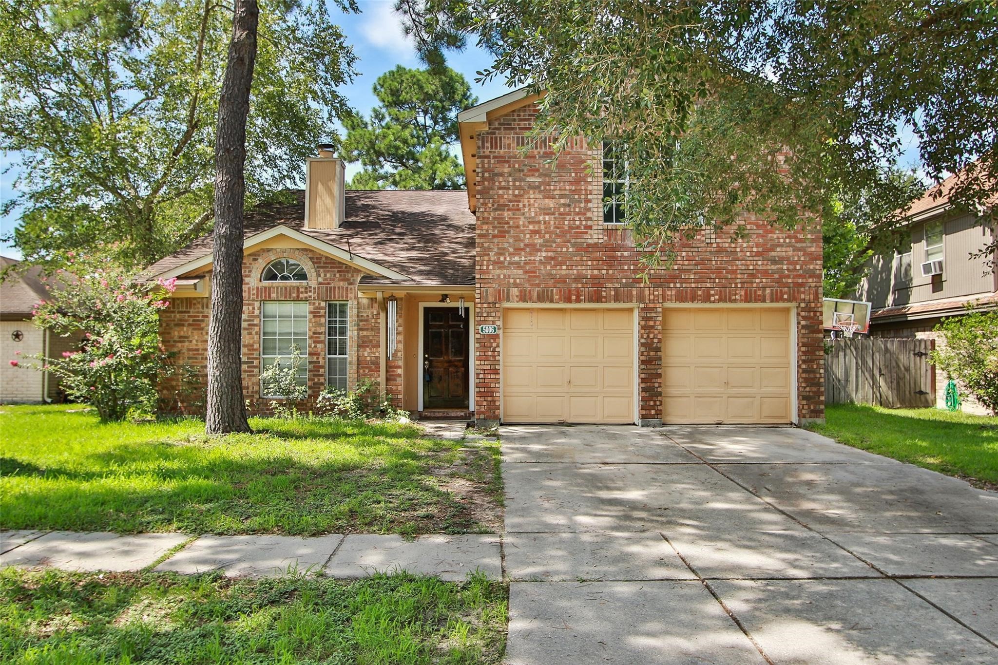 5006 Temple Bell Drive Spring, TX 77388 - Photo 1 of 27 Front View - Great shaded front yard