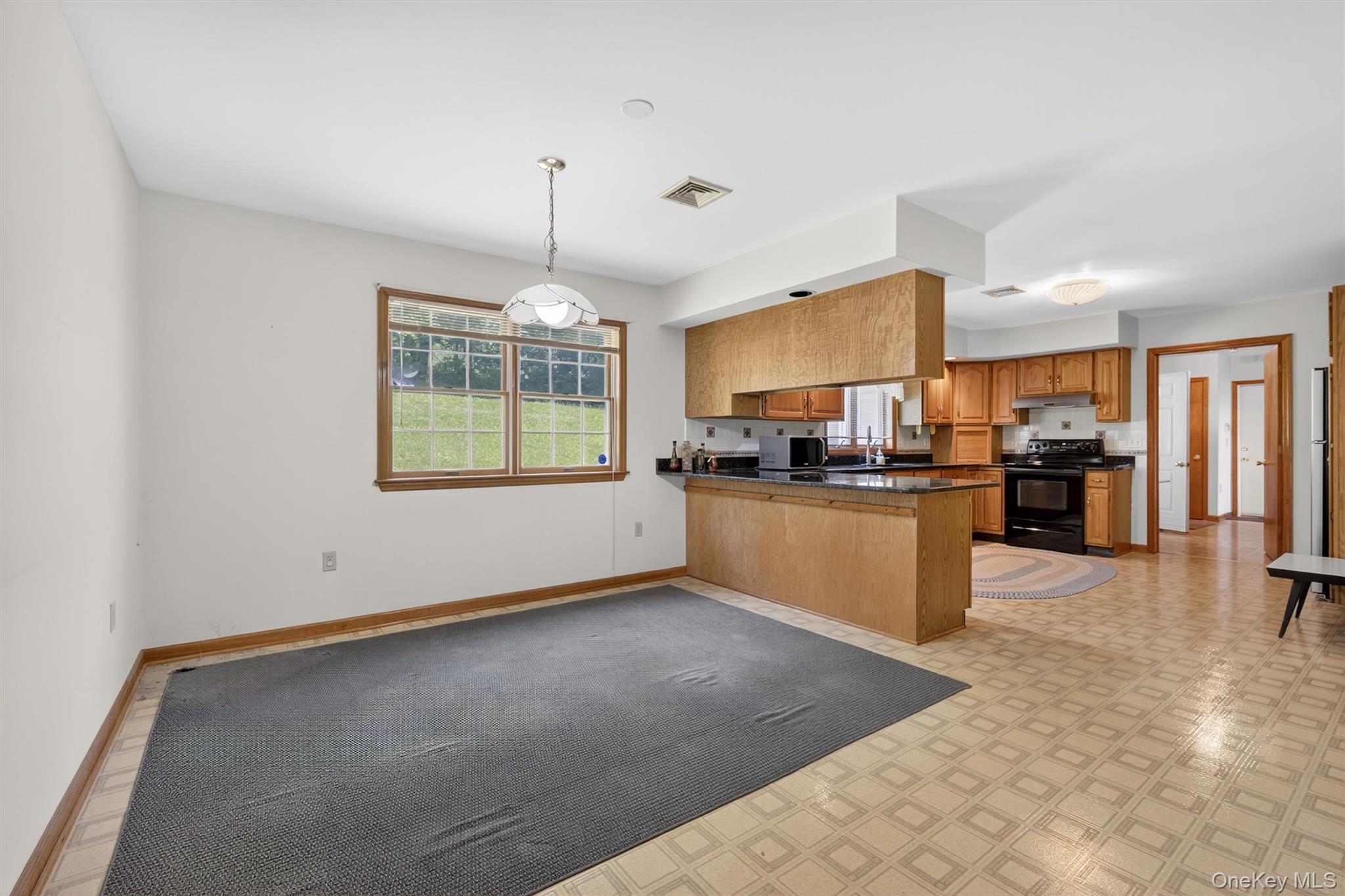 561 Toleman Road Rock Tavern, NY 12575 - Photo 11 of 31 a kitchen with stainless steel appliances granite countertop a refrigerator a sink dishwasher a stove with white cabinets