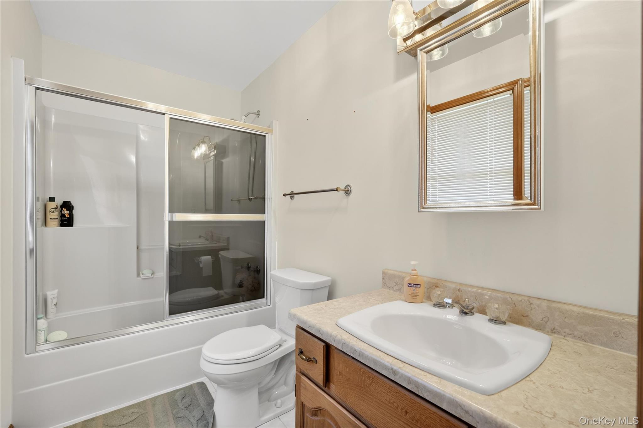 561 Toleman Road Rock Tavern, NY 12575 - Photo 26 of 31 a bathroom with a sink toilet and shower