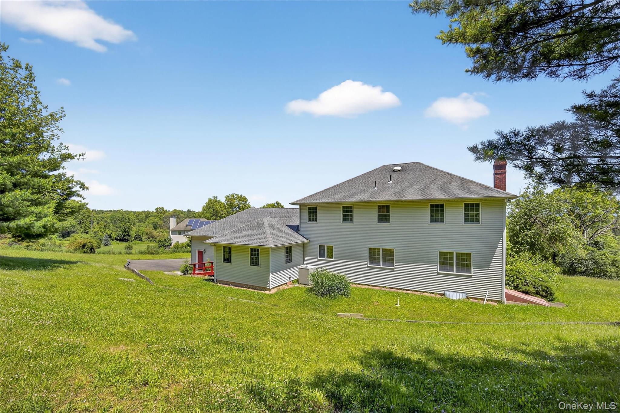 561 Toleman Road Rock Tavern, NY 12575 - Photo 28 of 31 a front view of a house with garden