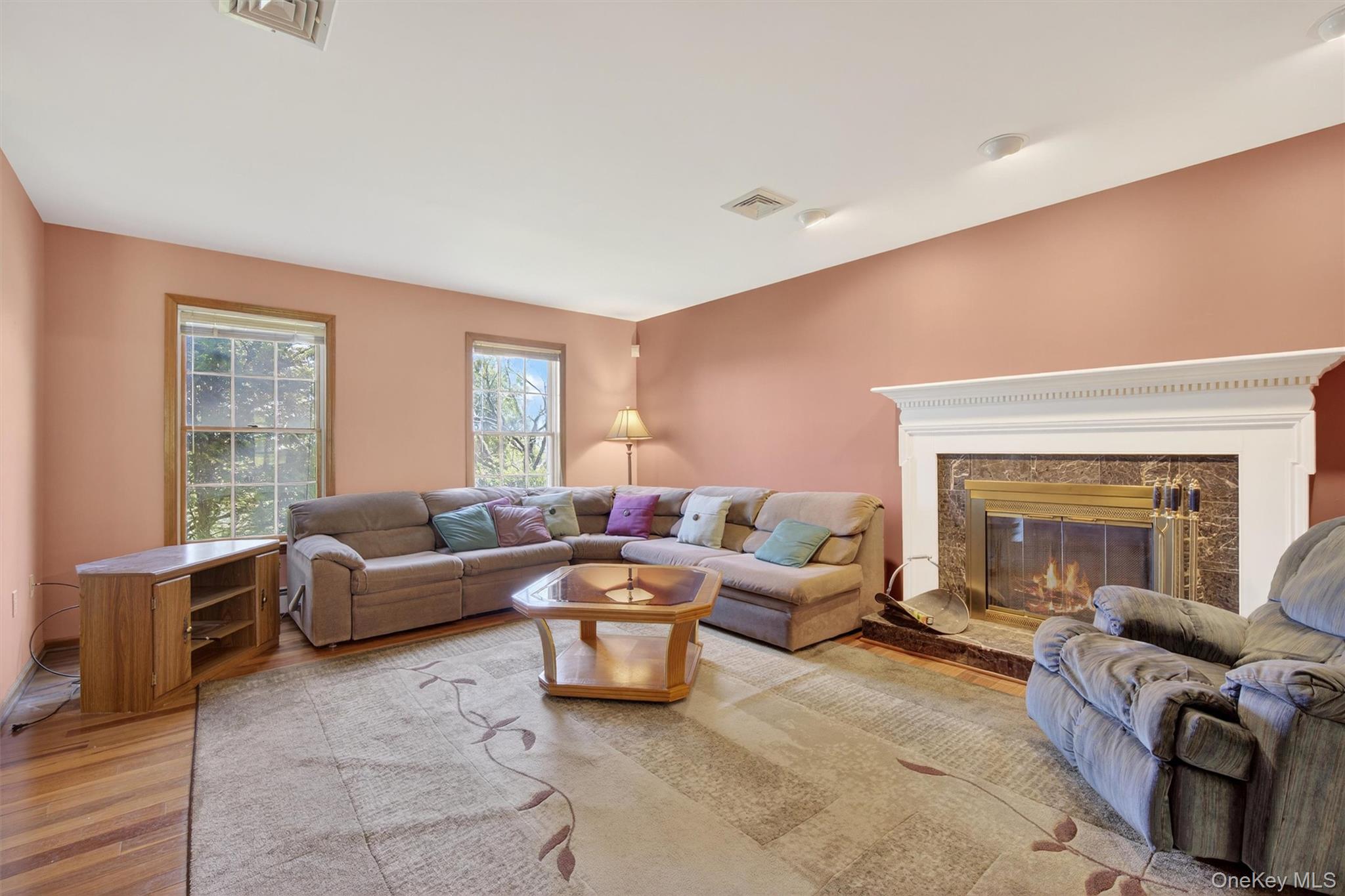 561 Toleman Road Rock Tavern, NY 12575 - Photo 7 of 31 a living room with furniture and a fireplace
