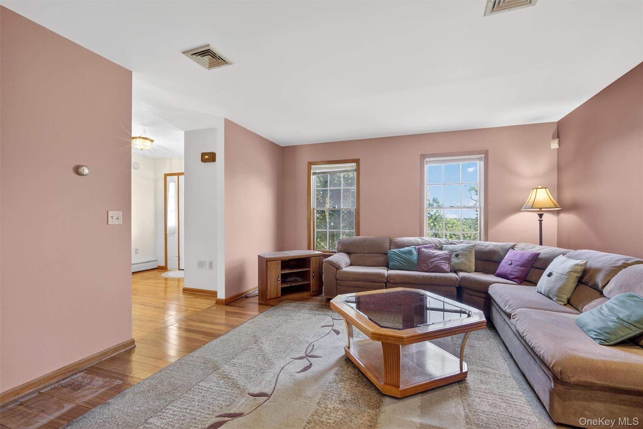 561 Toleman Road Rock Tavern, NY 12575 - Photo 8 of 31 a living room with furniture gym equipment and a window