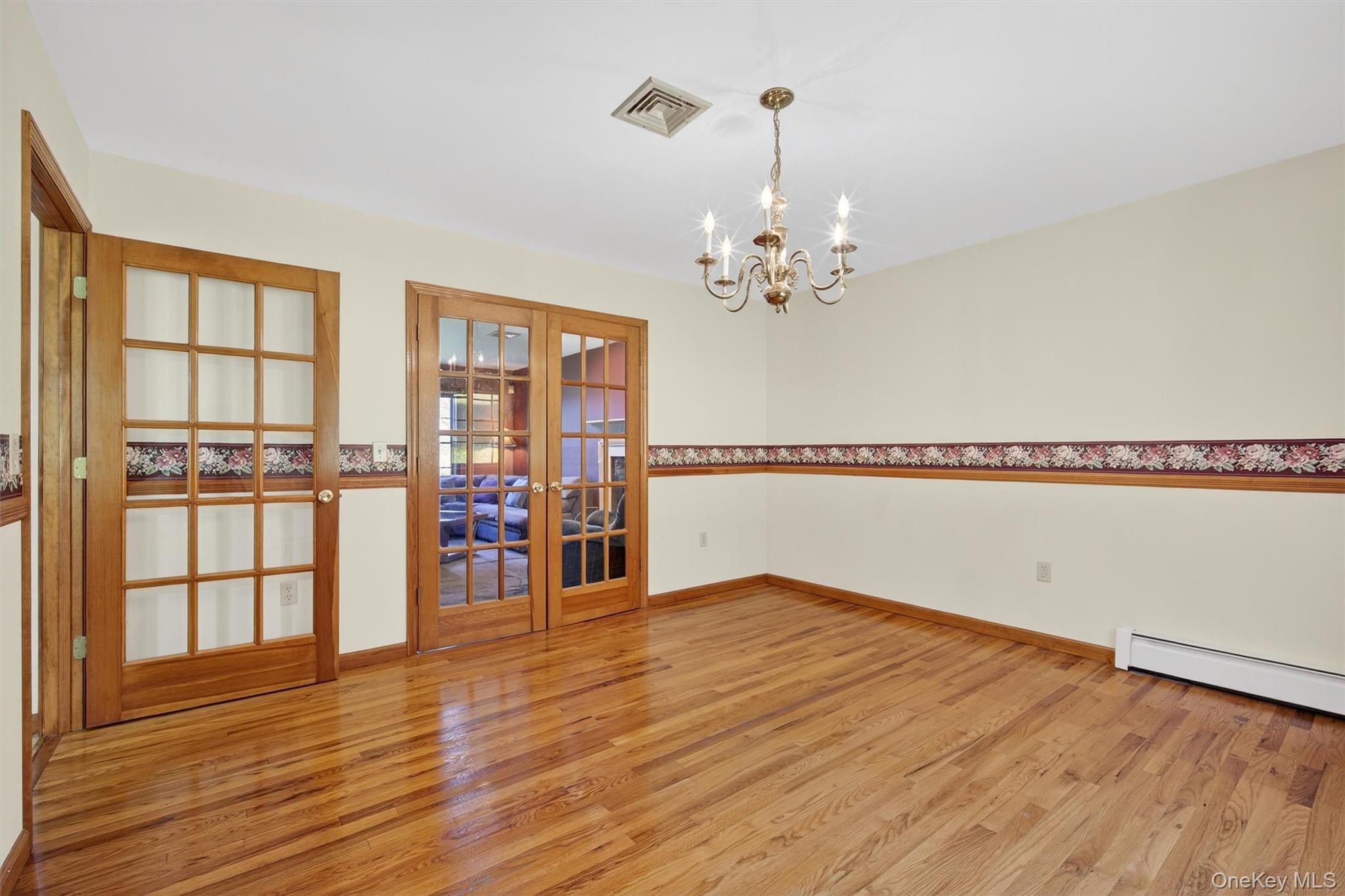 561 Toleman Road Rock Tavern, NY 12575 - Photo 10 of 31 a view of a livingroom with wooden floor