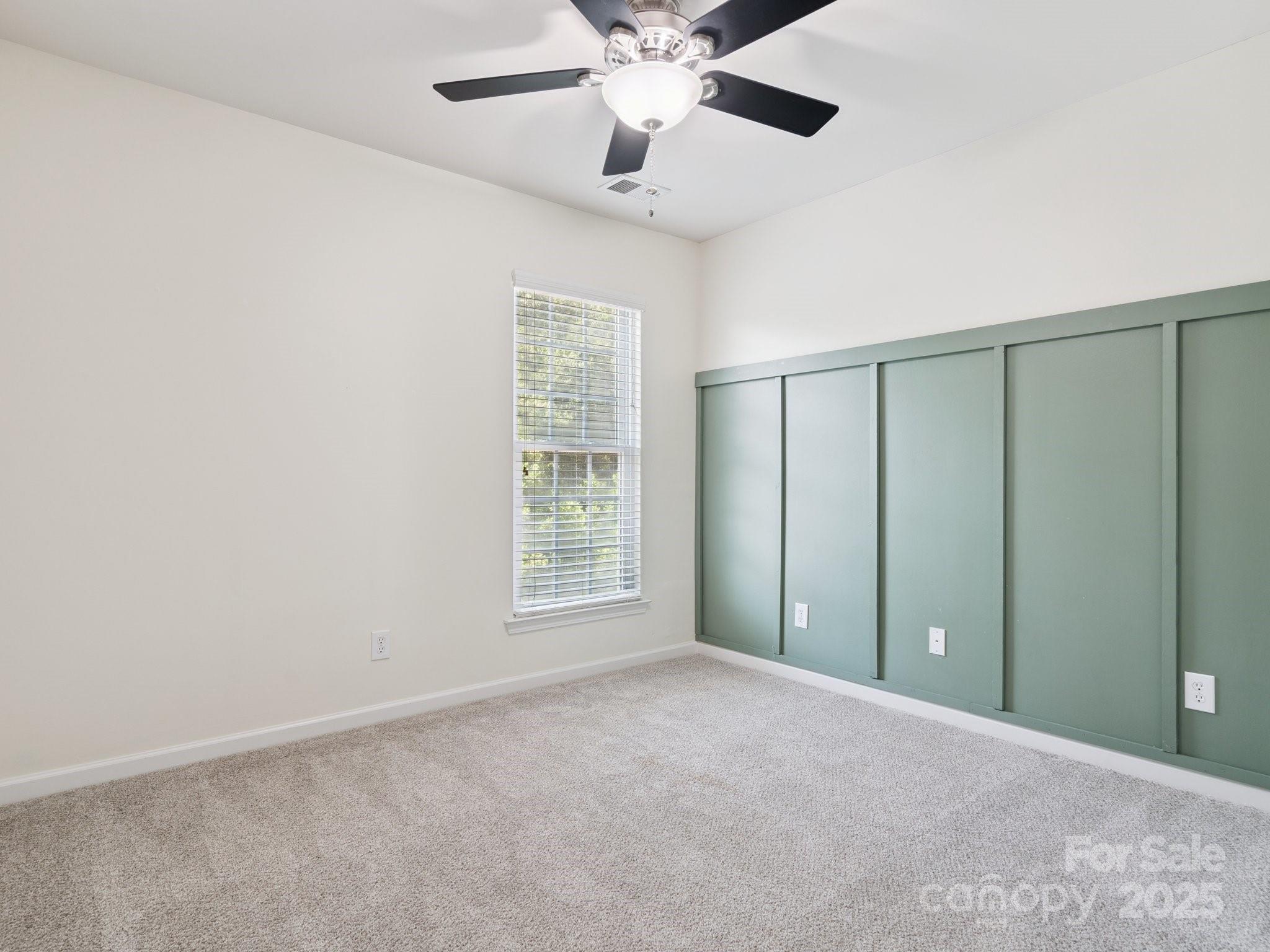 570 6th Baxter Crossing Fort Mill, SC 29708 - Photo 19 of 37 an empty room with windows and fan