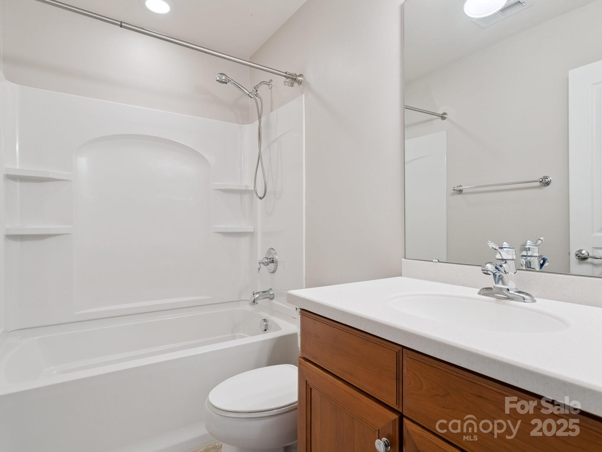 570 6th Baxter Crossing Fort Mill, SC 29708 - Photo 21 of 37 a bathroom with a sink a toilet and a bathtub