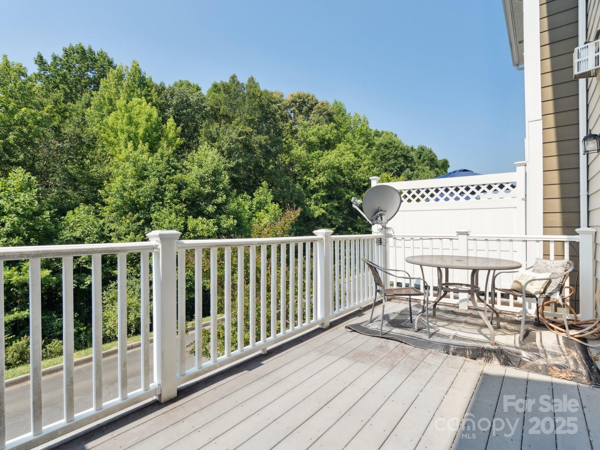 570 6th Baxter Crossing Fort Mill, SC 29708 - Photo 27 of 37 a view of balcony with wooden floor and seating space