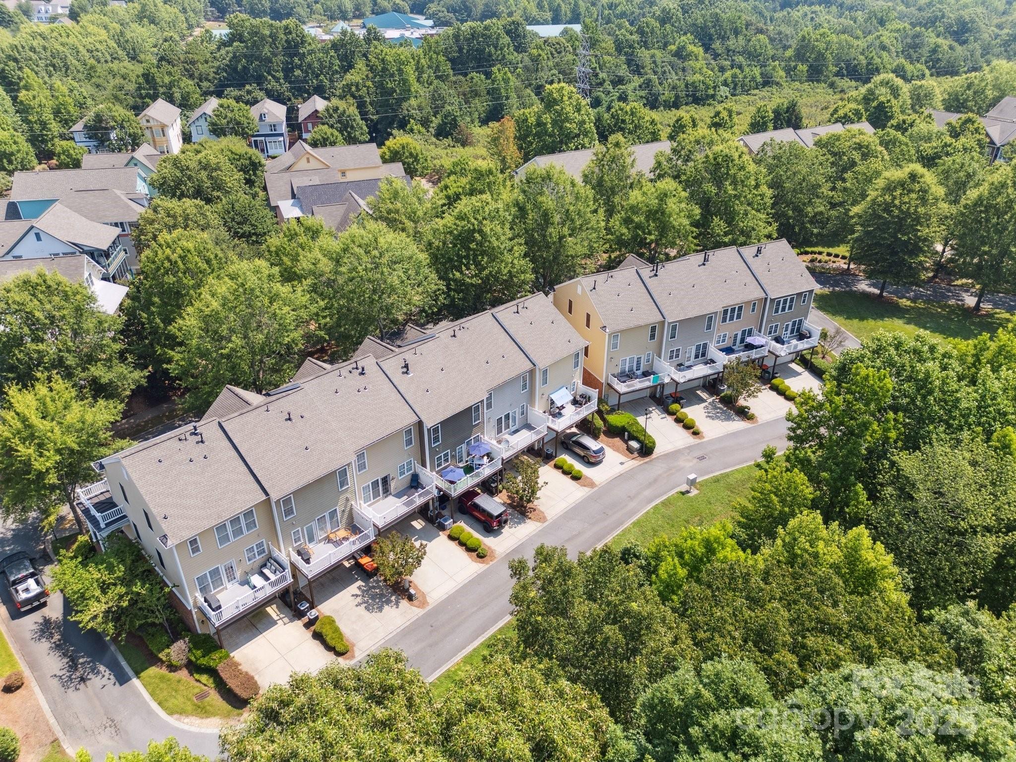 570 6th Baxter Crossing Fort Mill, SC 29708 - Photo 29 of 37 an aerial view of a house with a yard