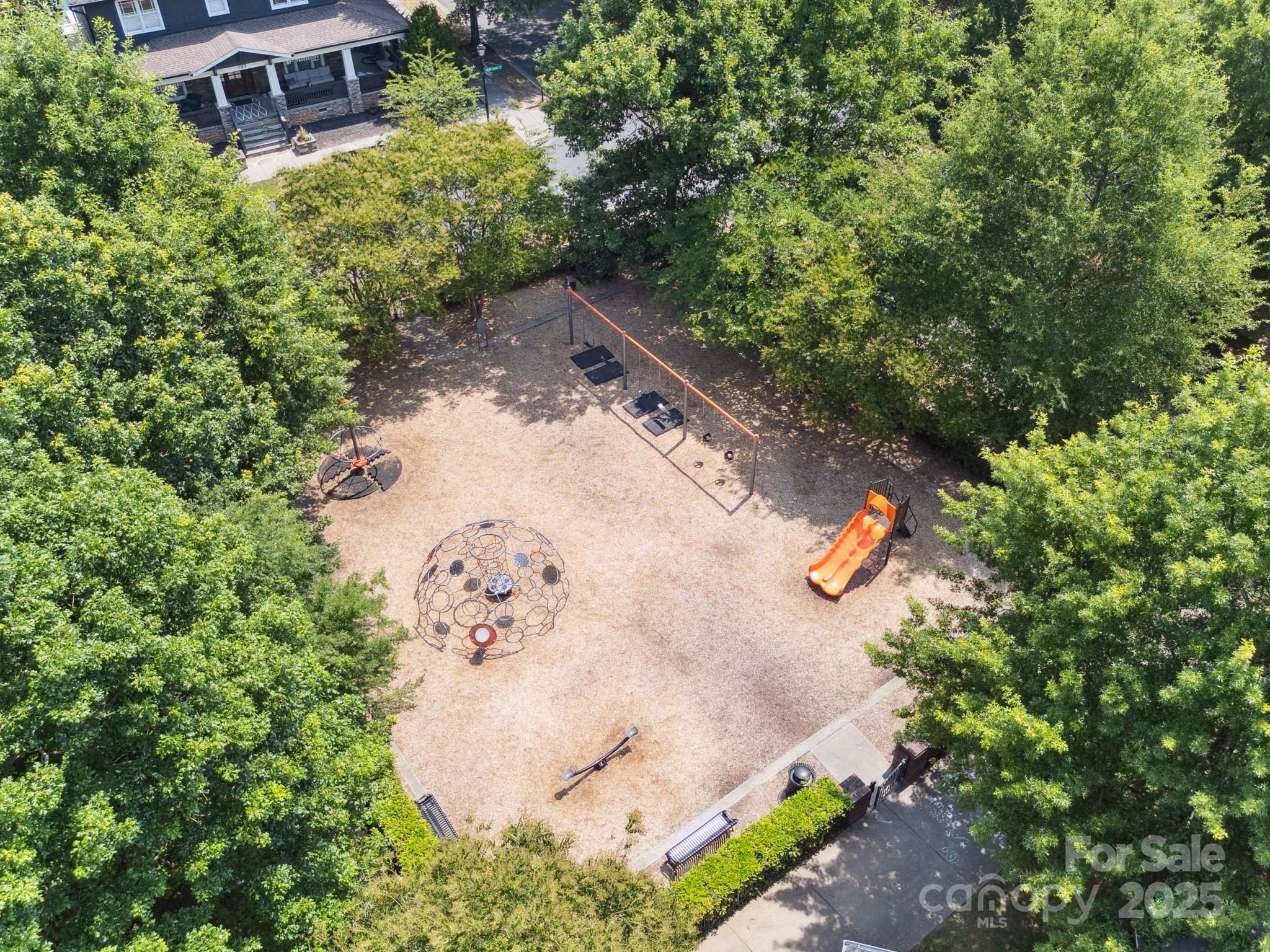 570 6th Baxter Crossing Fort Mill, SC 29708 - Photo 32 of 37 a view of a wooden house with a yard