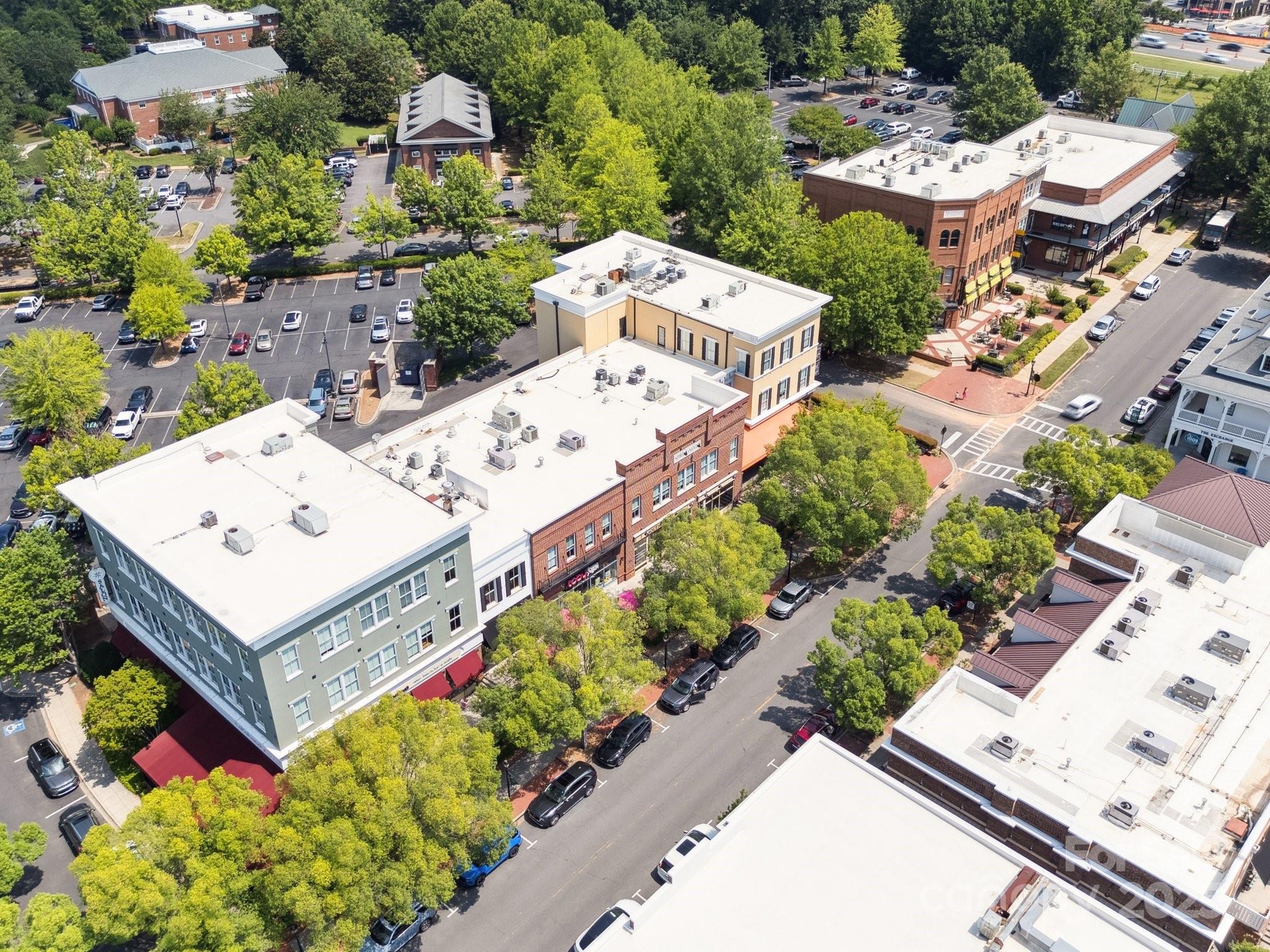 570 6th Baxter Crossing Fort Mill, SC 29708 - Photo 35 of 37 an aerial view of a house with a yard and garden