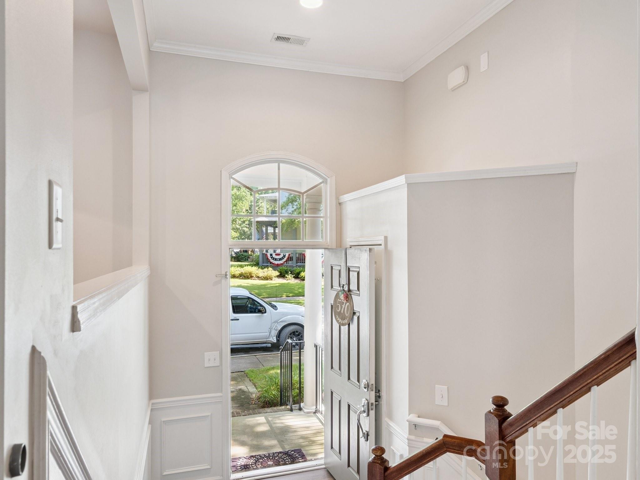 570 6th Baxter Crossing Fort Mill, SC 29708 - Photo 4 of 37 a view of a hallway with a dining area