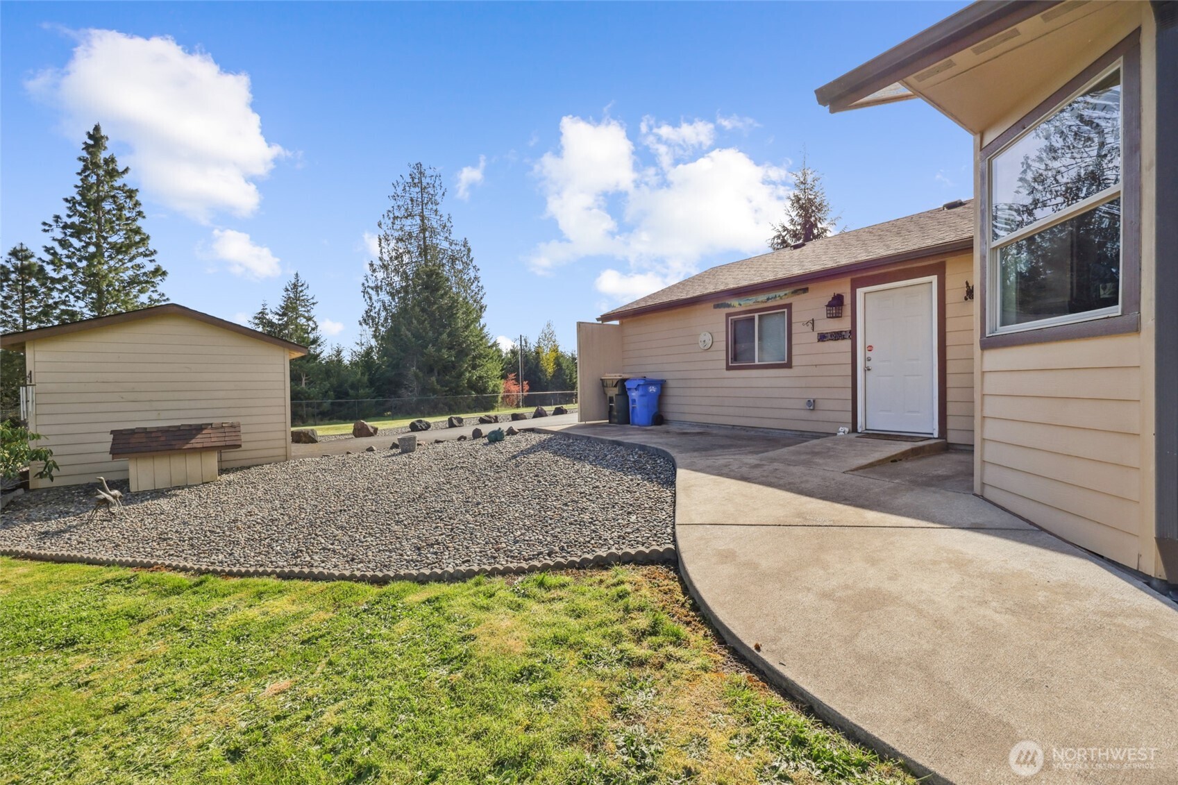 12245 Langworthy Road Southwest Rochester, WA 98579 - Photo 29 of 39 a house view with a backyard space