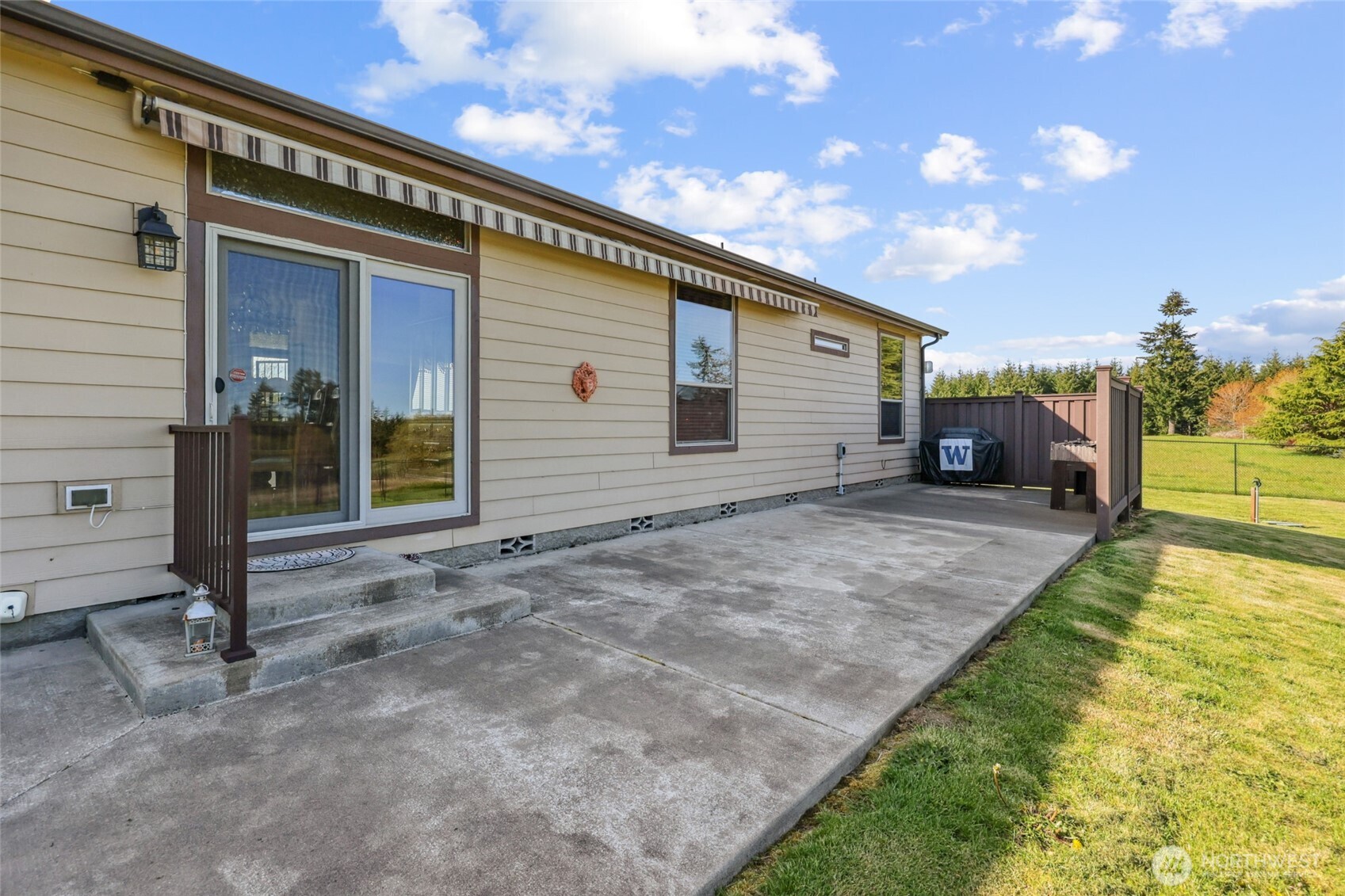 12245 Langworthy Road Southwest Rochester, WA 98579 - Photo 30 of 39 a view of a house with backyard and a tree