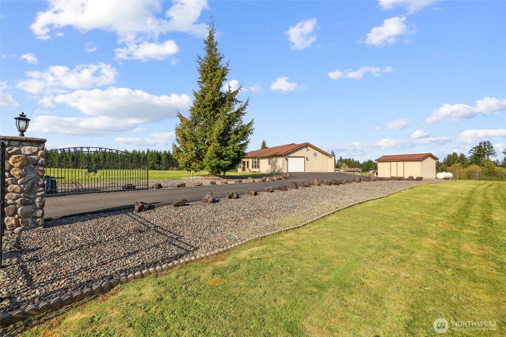 12245 Langworthy Road Southwest Rochester, WA 98579 - Photo 3 of 39 a view of a road with an ocean view