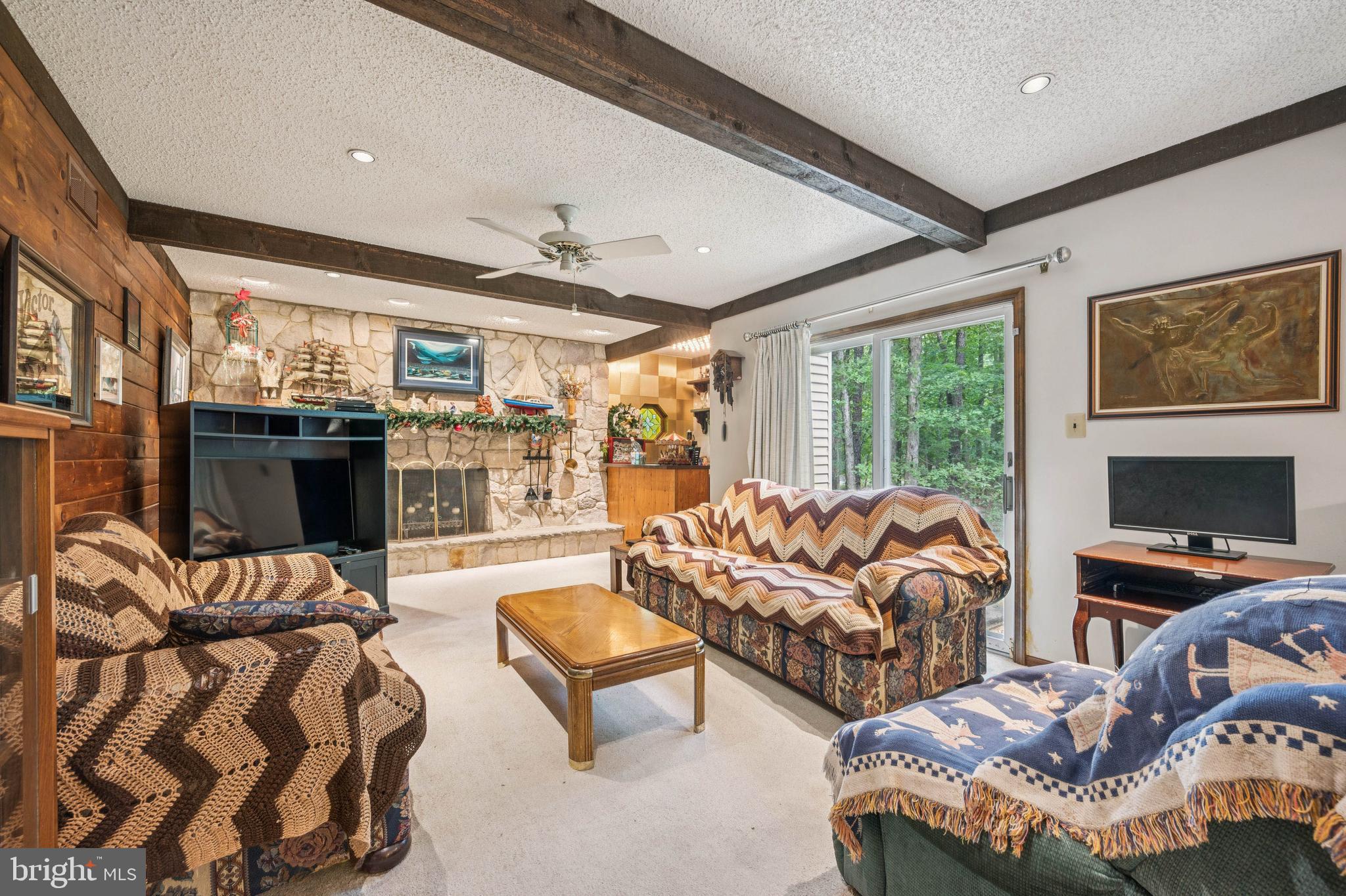 1 Dickson Drive Medford, NJ 08055 - Photo 14 of 38 Family Room with Stone Fireplace & Slider to Yard