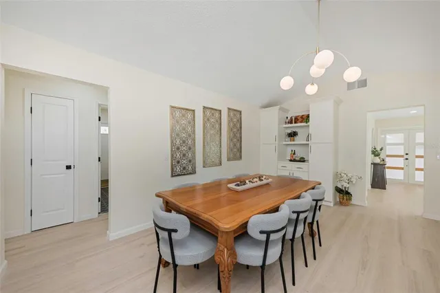 a bathroom with a double vanity sink a mirror and a shower
