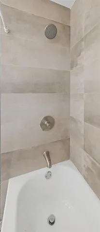 a view of a swimming pool with a chair