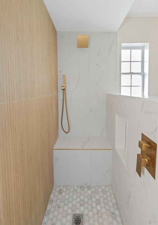 11419 47th Avenue North St. Petersburg, FL 33708 - Photo 62 of 94 a bathroom with a shower