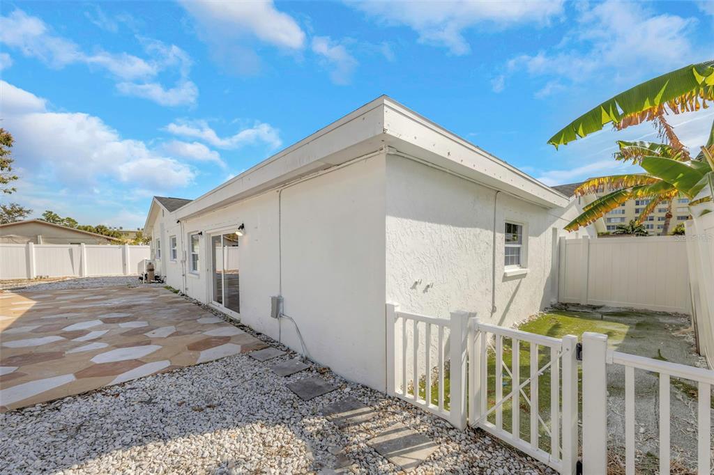 11419 47th Avenue North St. Petersburg, FL 33708 - Photo 69 of 94 a view of a house with a yard