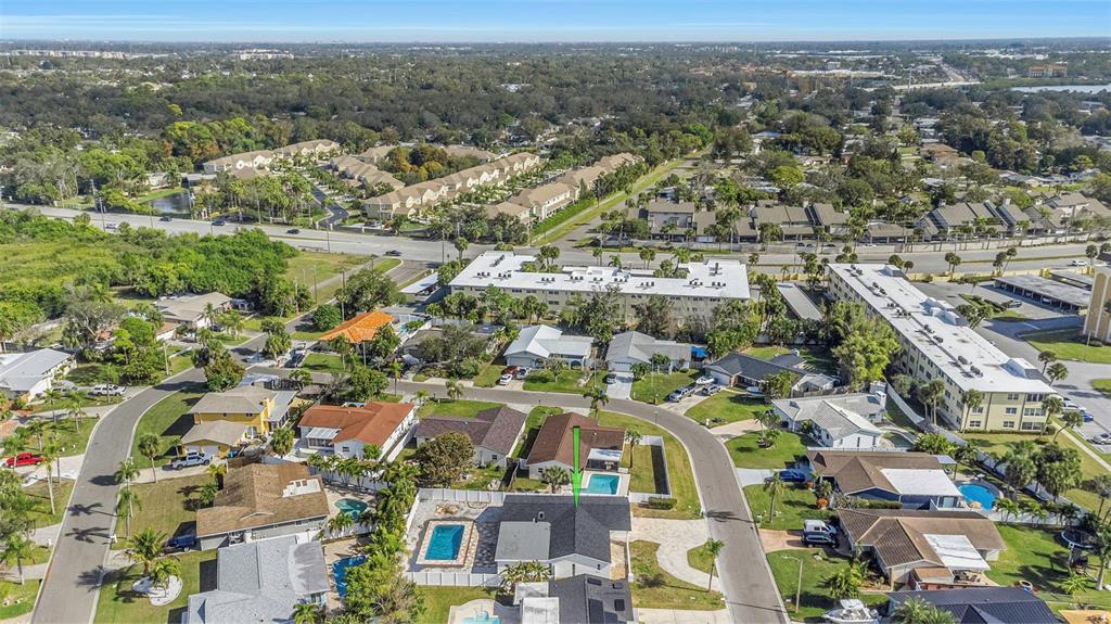 11419 47th Avenue North St. Petersburg, FL 33708 - Photo 83 of 94 an aerial view of residential building and parking space