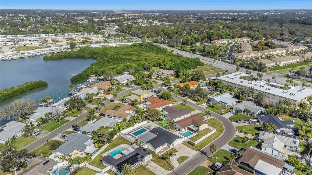 11419 47th Avenue North St. Petersburg, FL 33708 - Photo 84 of 94 an aerial view of residential houses with outdoor space