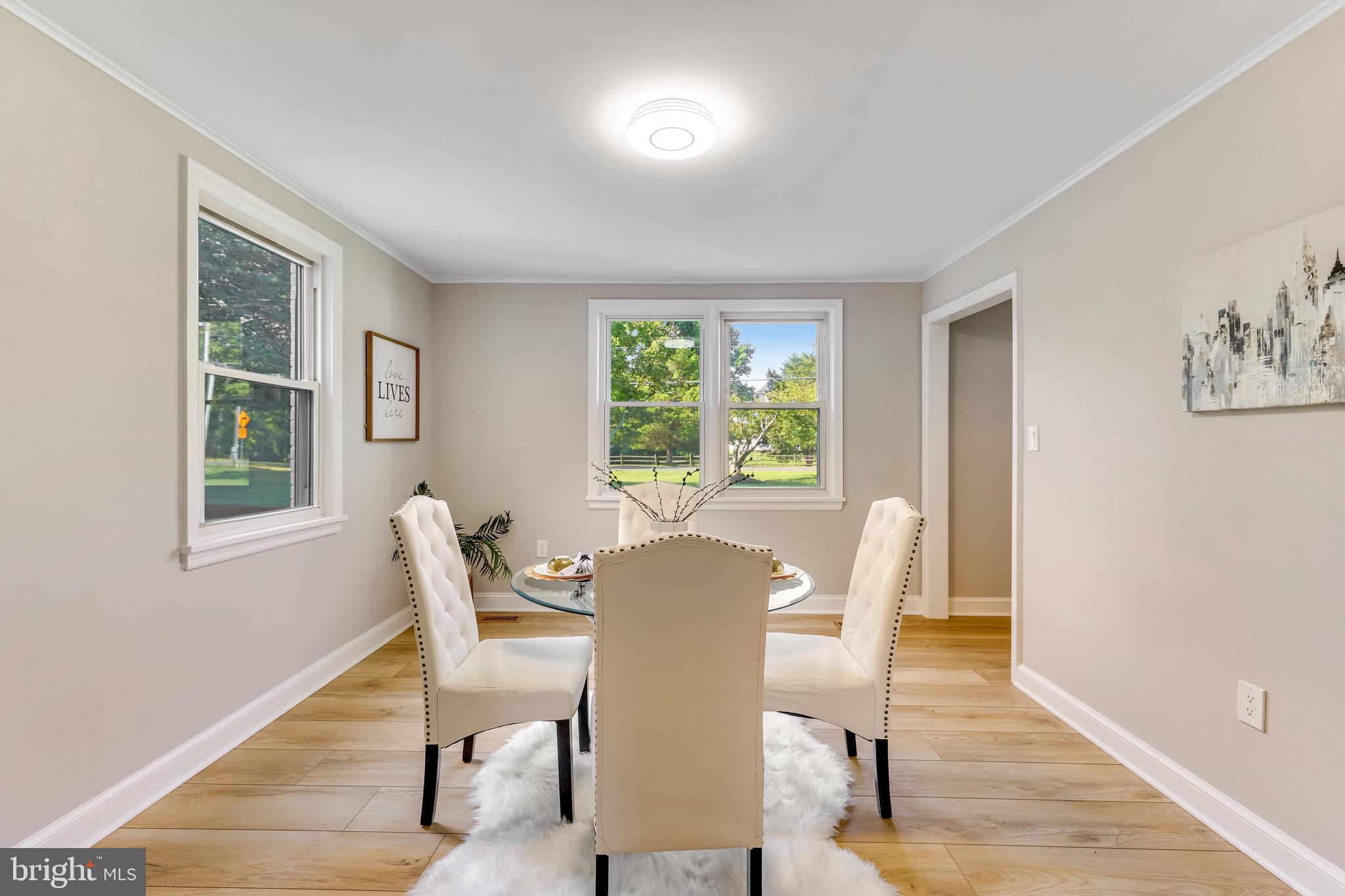 11410 Waples Mill Road Oakton, VA 22124 - Photo 12 of 62 Bright dining space with garden views.